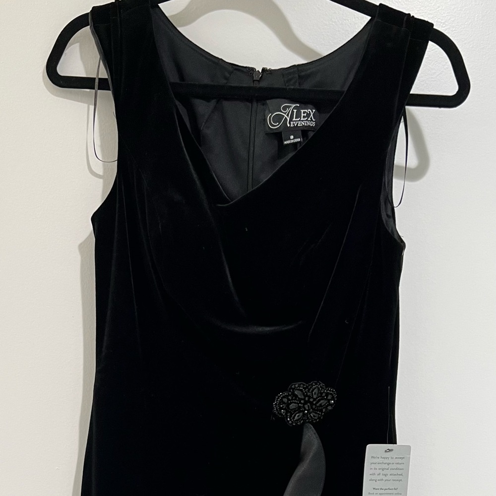 Alex Evening knee length evening dress. Mixed media and fully lined.